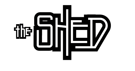 A black and white logo for the shed restaurant.